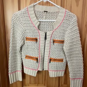 Free People zip-up sweater with color block zipper pockets